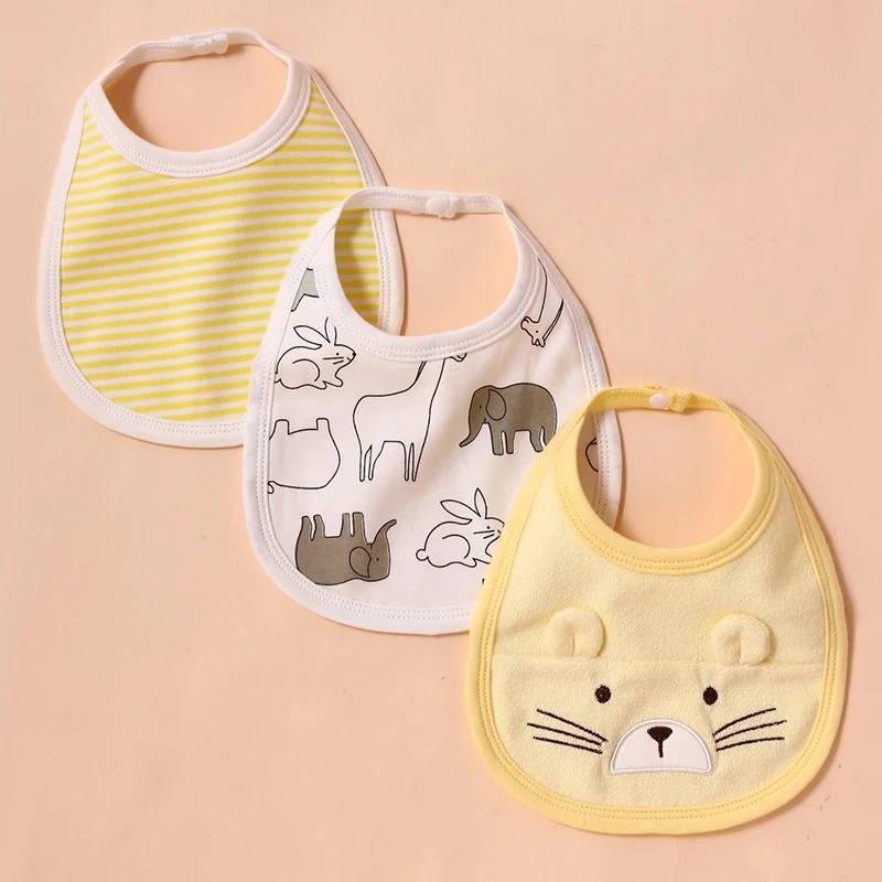 Babero reversible con cierre de broches