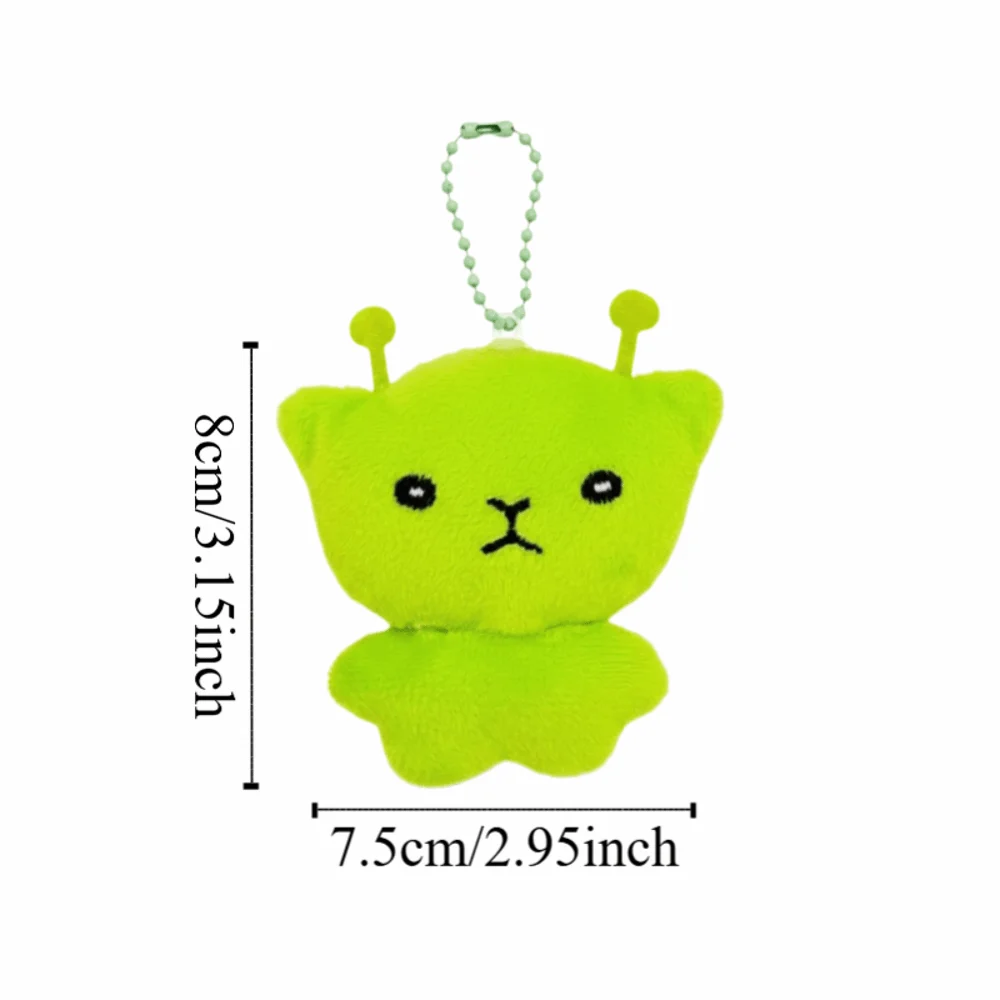 Colgante de mochila de peluche suave de dibujos animados, vista frontal del gato alienígena con forma de estrella