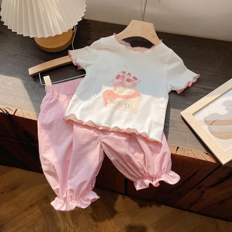 Conjunto de niña top y pantalón manga corta con estampado de dibujos - imagen 5