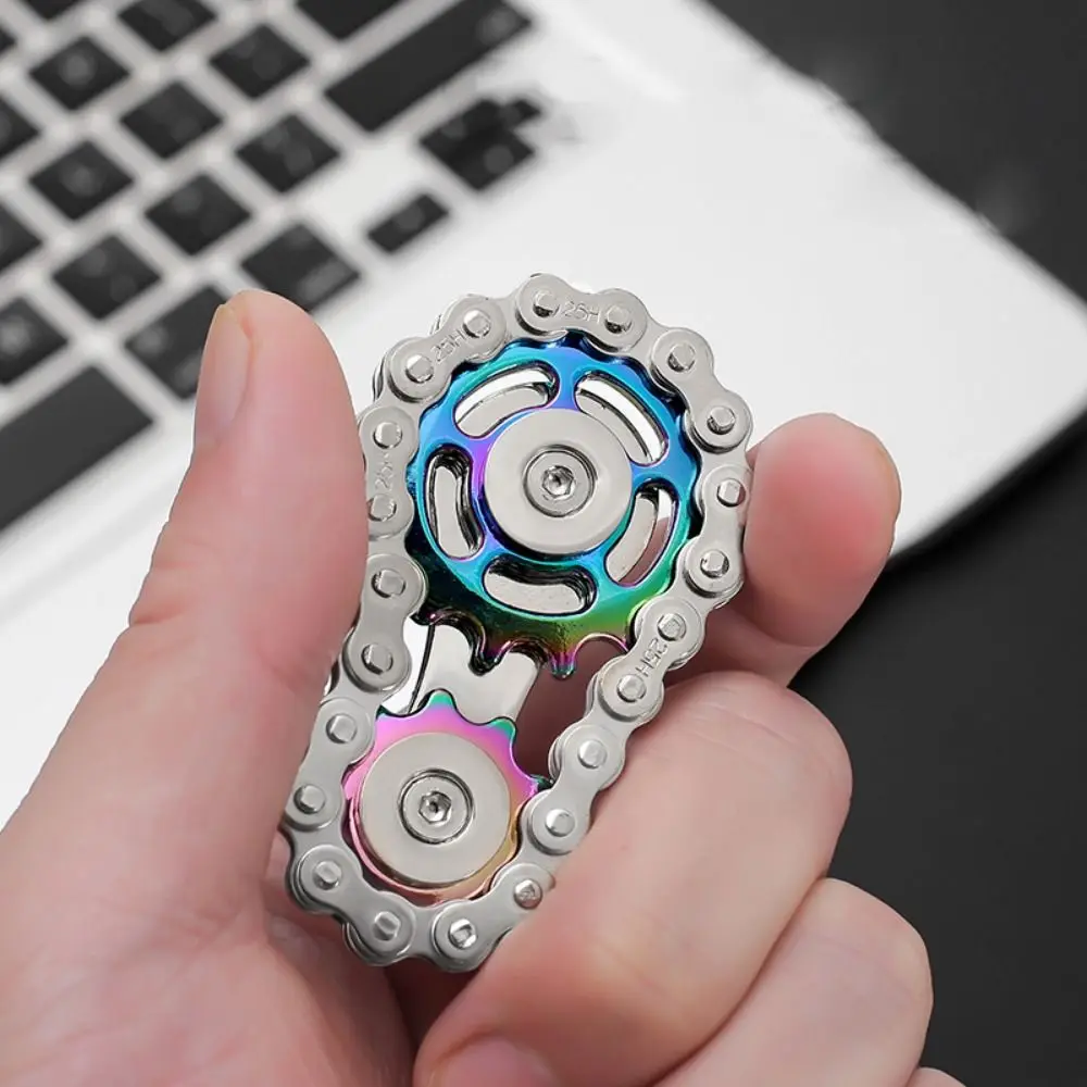 Spinner de dedo metálico con engranajes y giros antiestrés - imagen 4