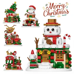 Bloques de construcción de invierno con mini figuras, luces