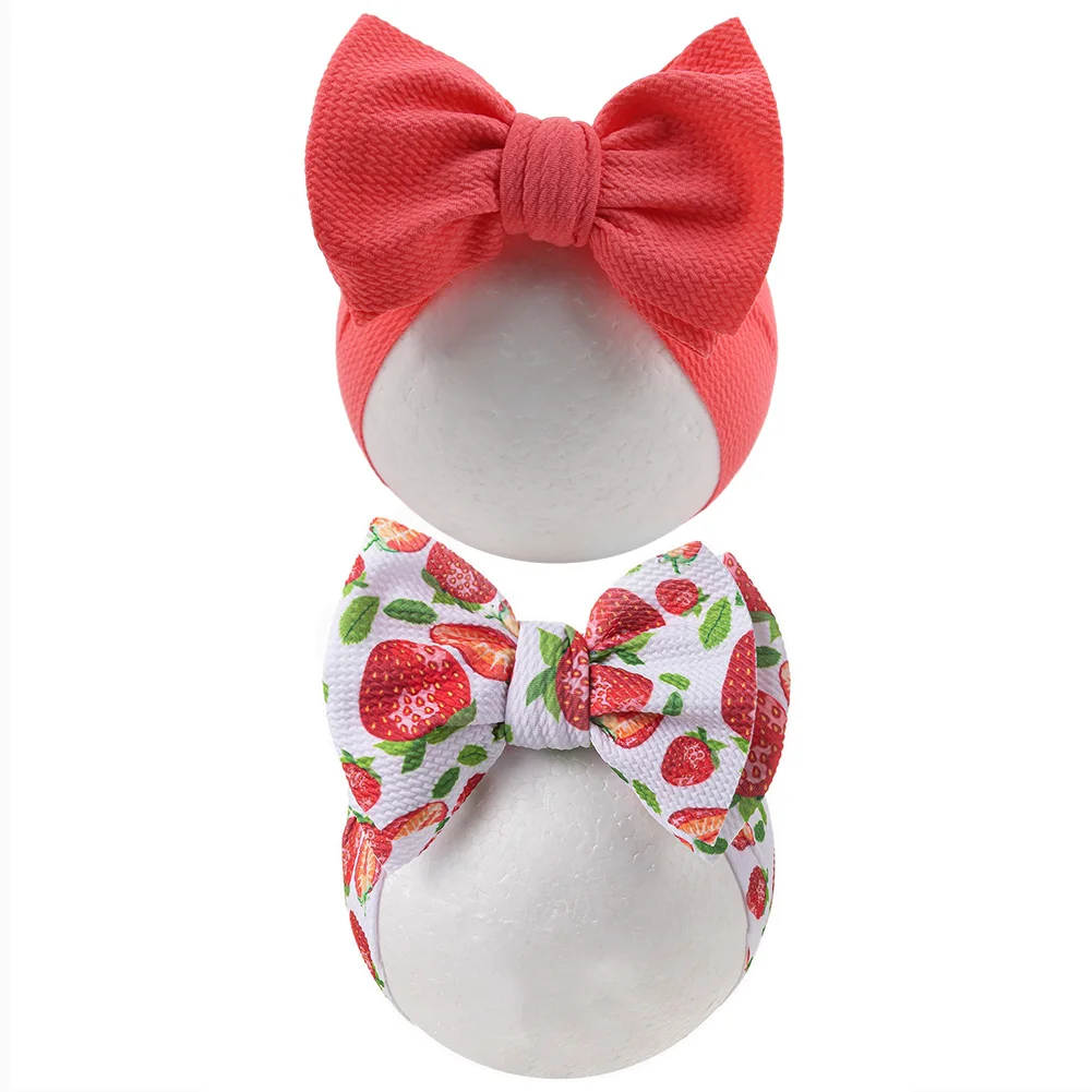 Diadema bebé con flor de fresa – Arcoíris