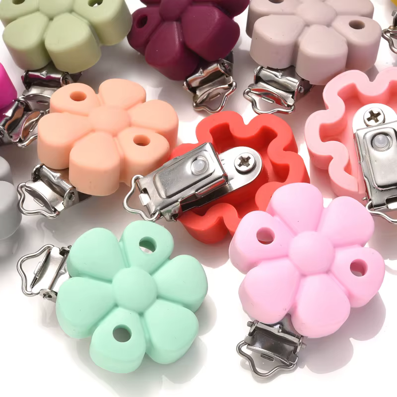 Clip de silicona floral multicolor para chupete