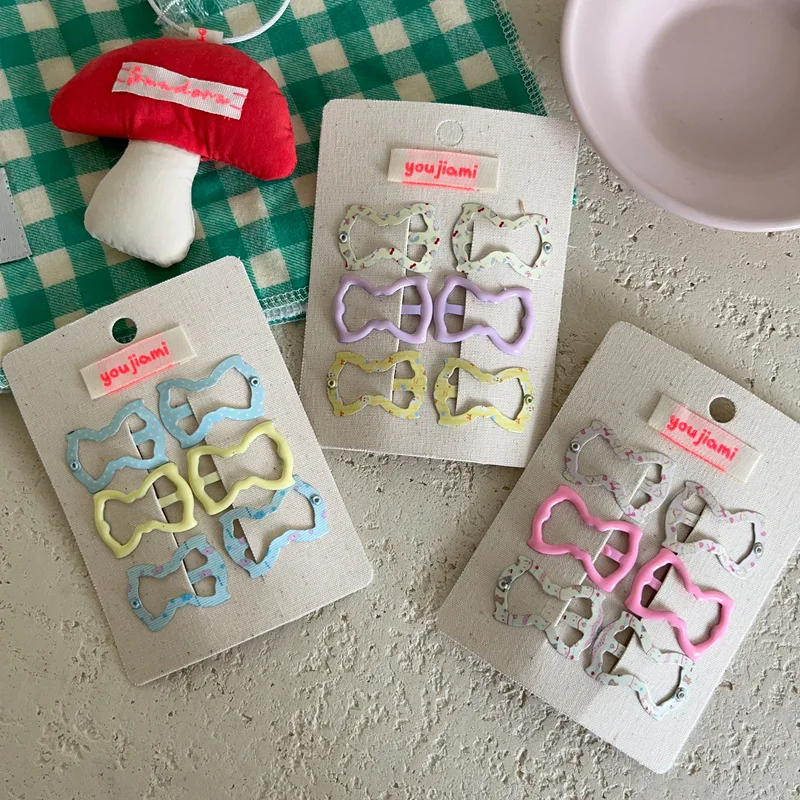 Pinzas infantiles con diseño decorativo