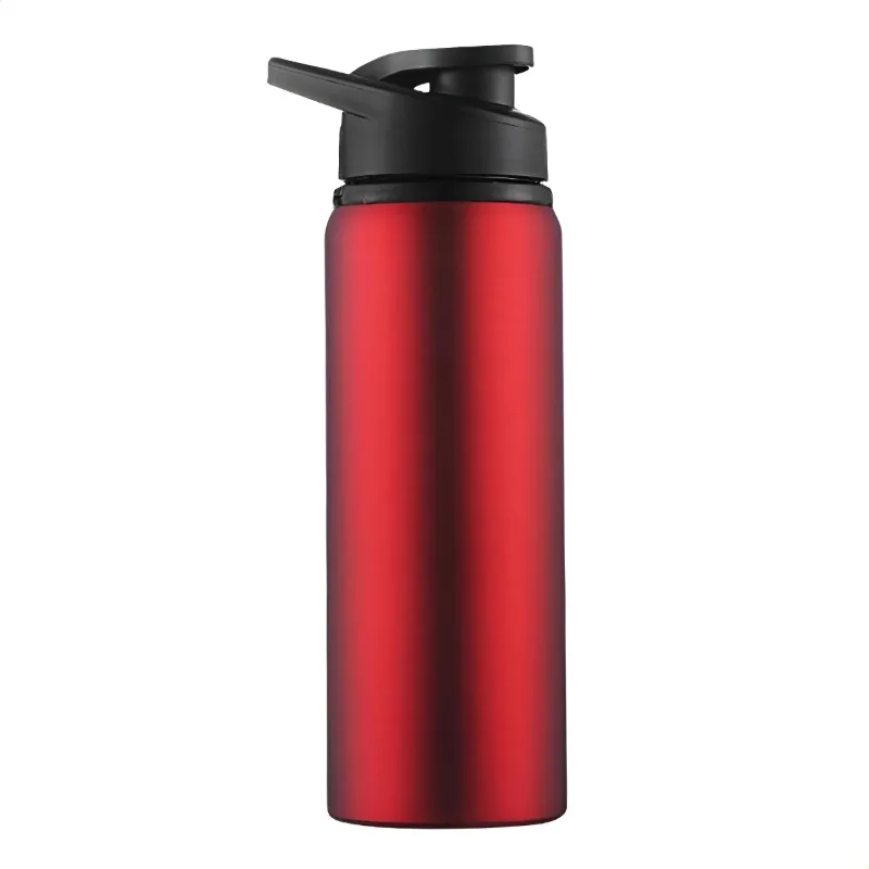 Botella de metal sobre superficie plana