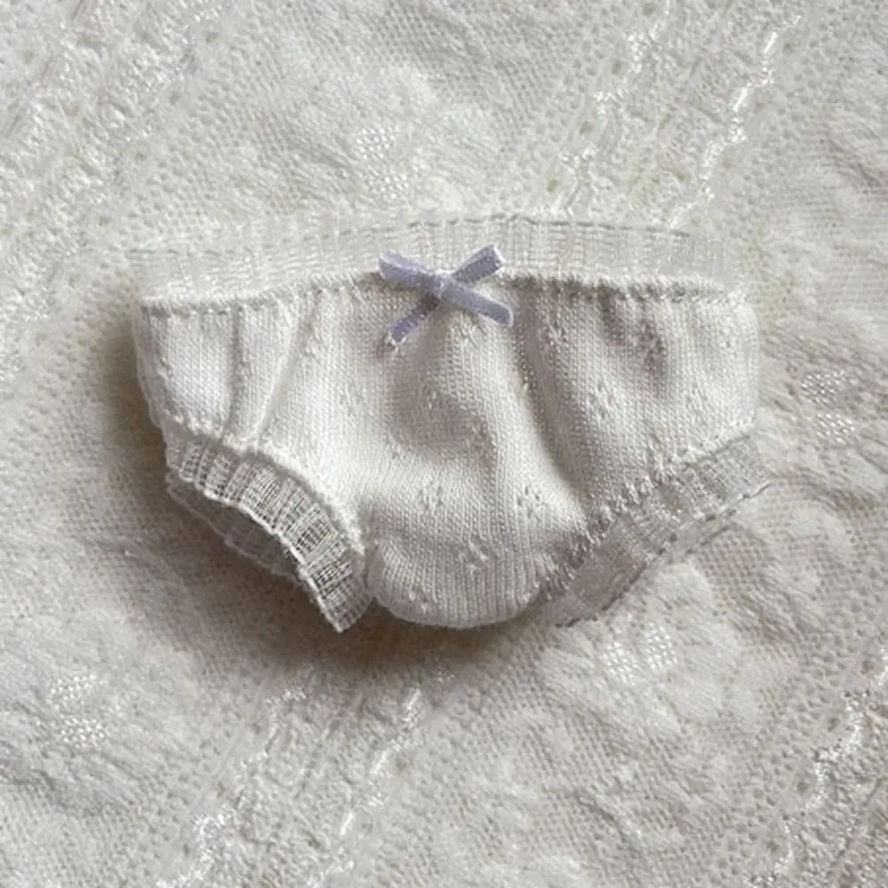 Braga de algodón blanca para muñeca de 20 cm