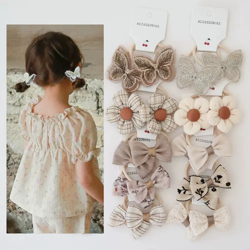 Diademas elásticas con flores y lazo para niñas