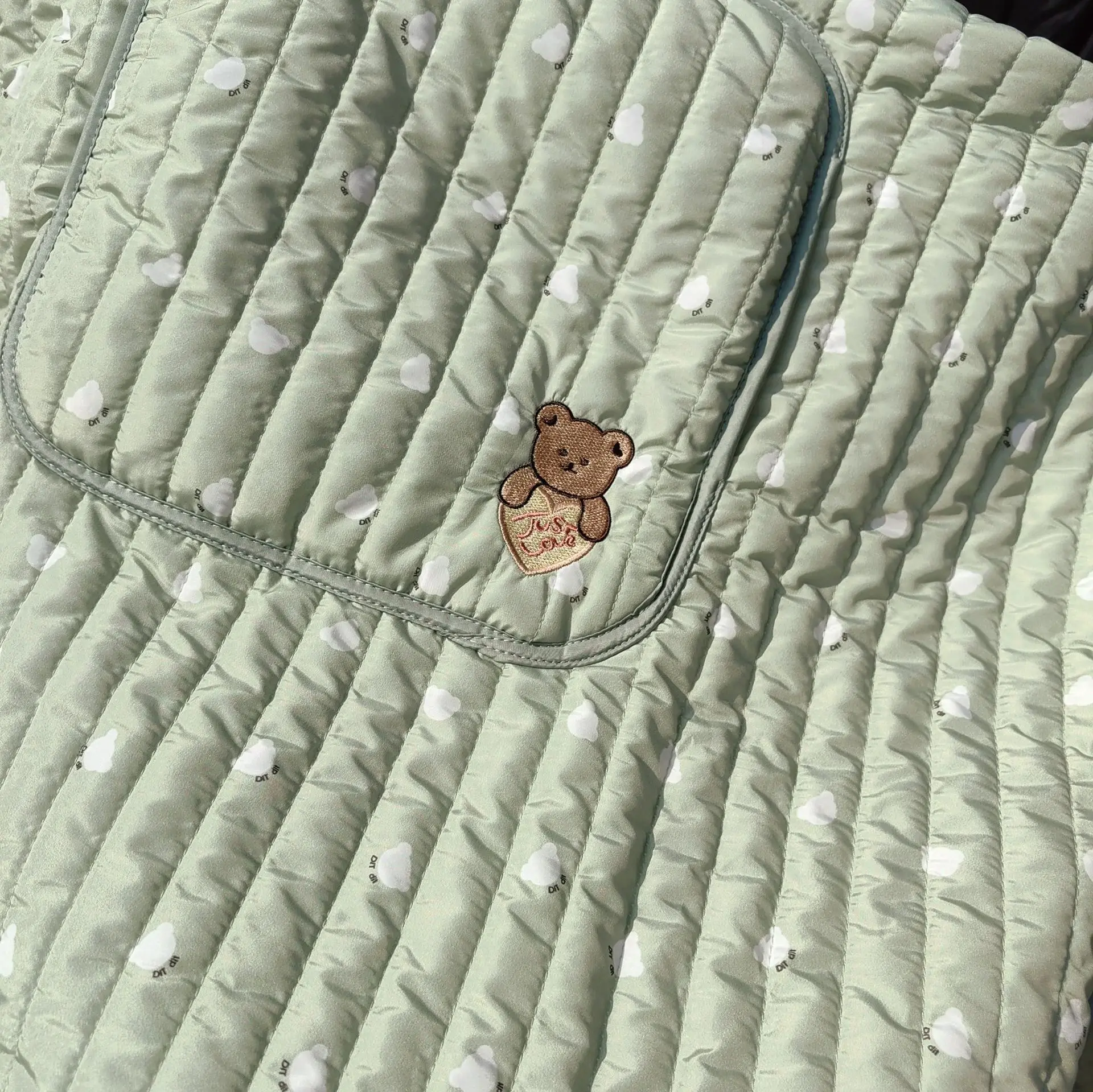 Poncho como manta para portabebés