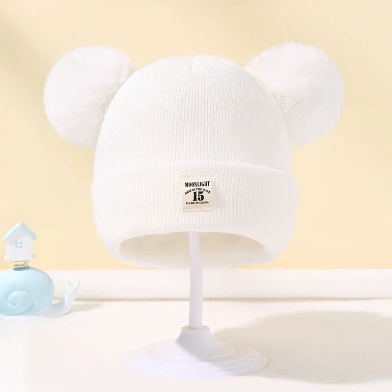 Gorro de invierno para bebé con pompón – cálido, suave y cómodo - imagen 2