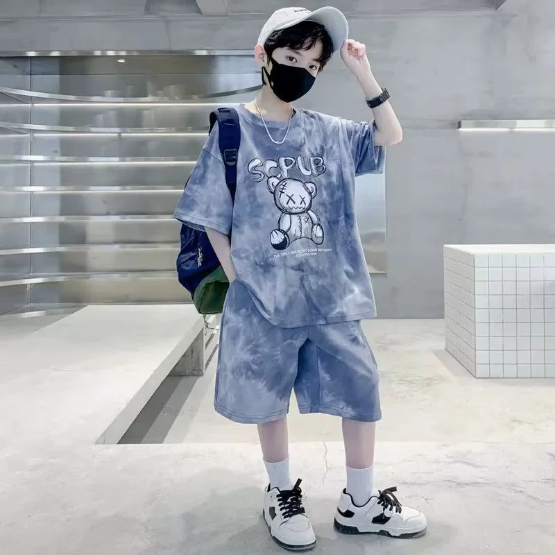 Traje deportivo infantil con estampado de dibujos animados
