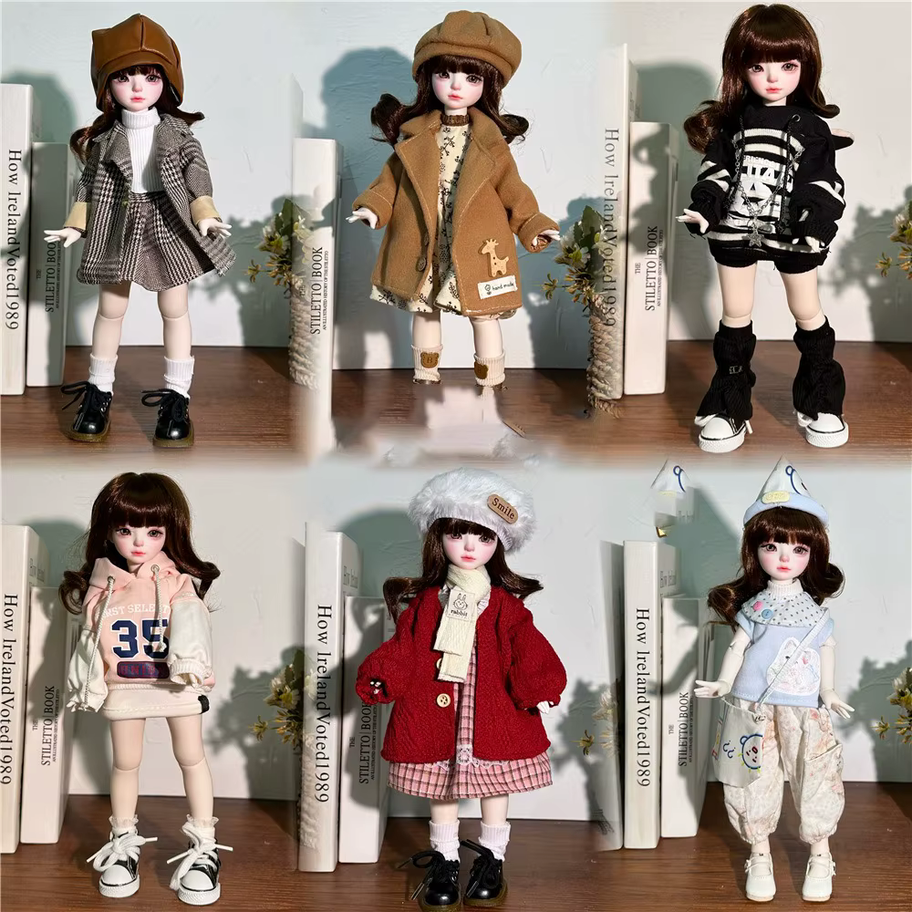 Muñeca BJD 1/6 con vestido rosa de tela