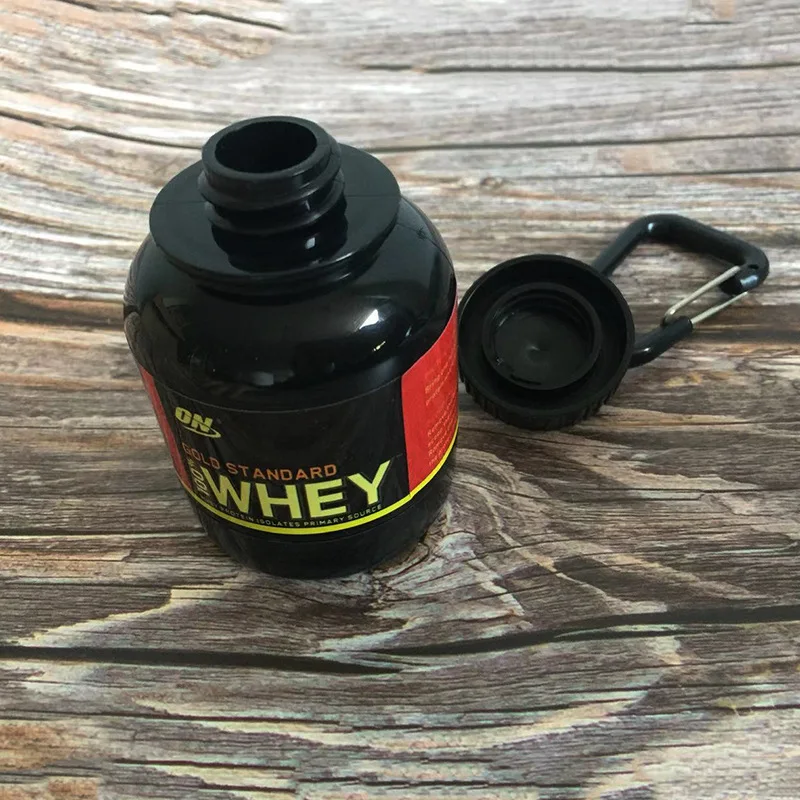 Mini contenedor de proteínas portátil con llavero y tapa hermética