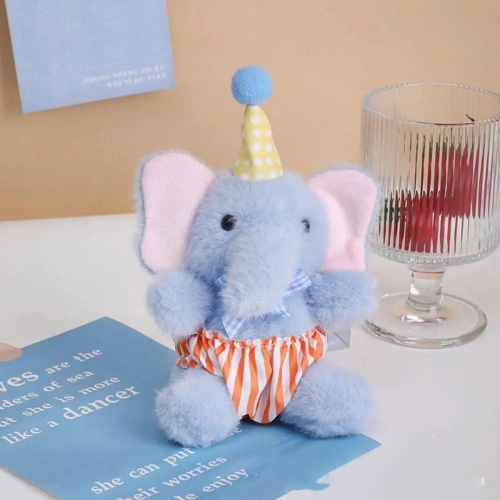Mochila infantil con elefante de peluche y delantal de pintor - imagen 2