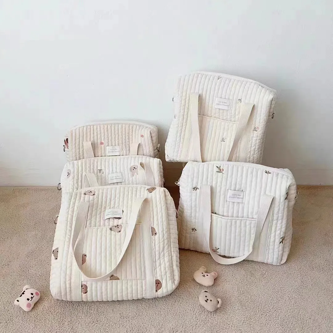 Bolsa de pañales impermeable y acolchada para bebé y mamá - imagen 3
