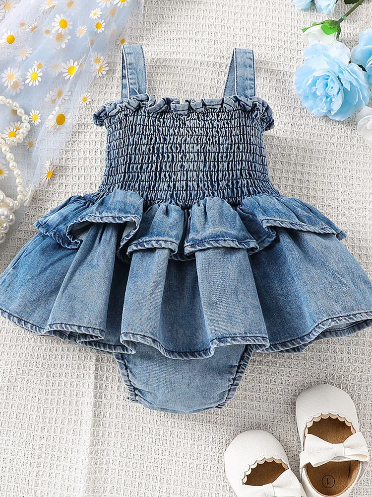 Camisola vaquera con volantes para bebé
