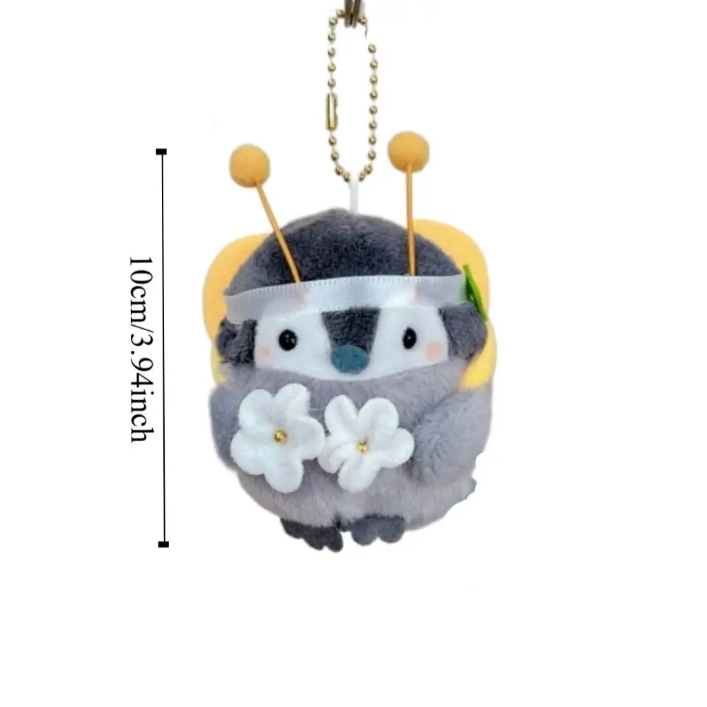 Llavero peluche pingüino suave colgante con diseño abeja y pan - imagen 4