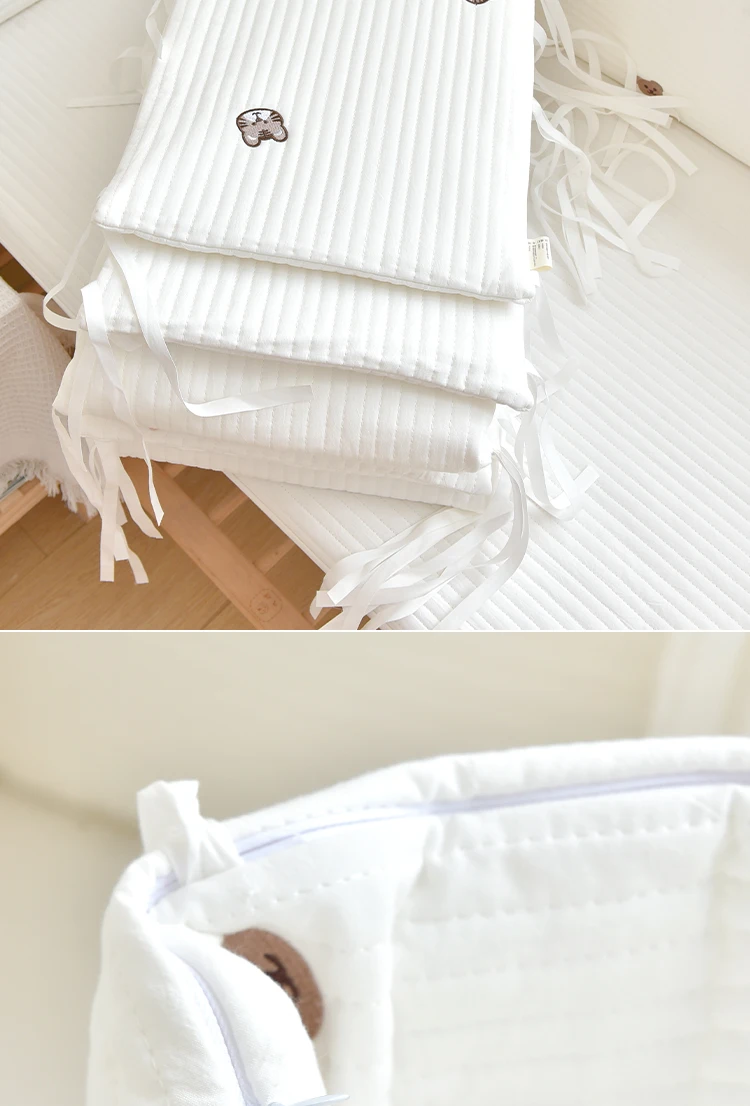 Vista del conjunto protector en la cama infantil