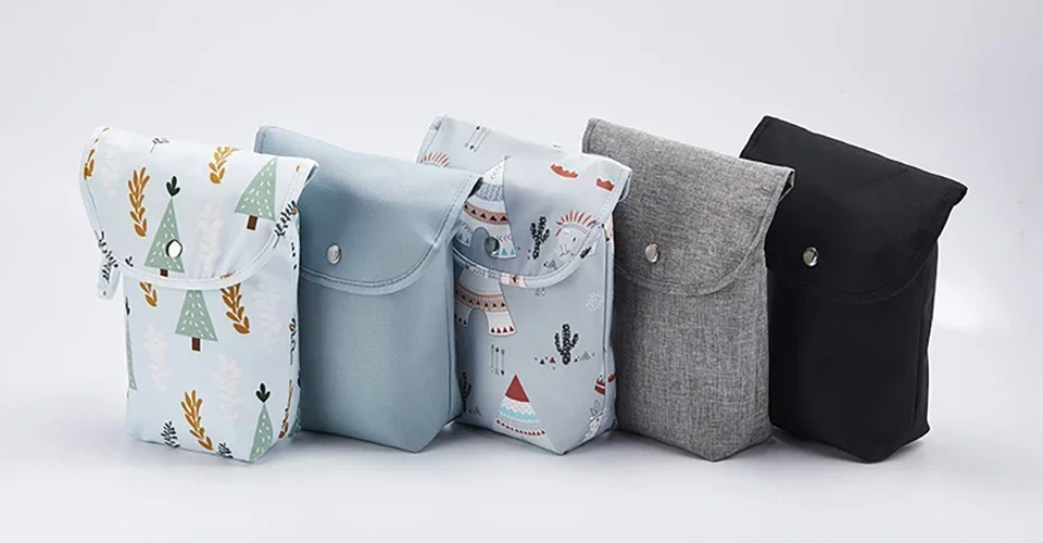 Bolsa de pañales impermeable con compartimento para organización