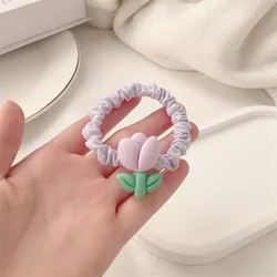 Banda para el pelo de niña tipo scrunchie con flor tulipán