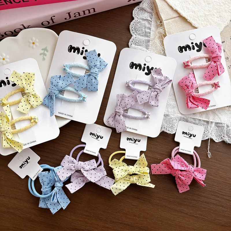 Accesorios para el cabello con lazo de lunares: pinzas y diademas