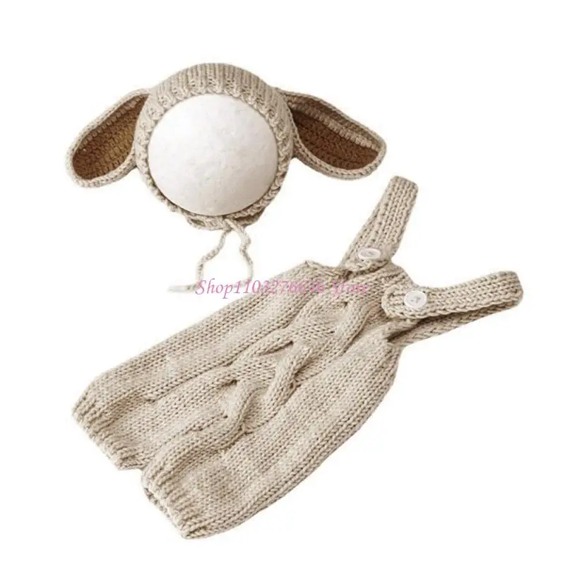 Bebé con gorro de conejito y conjunto de punto