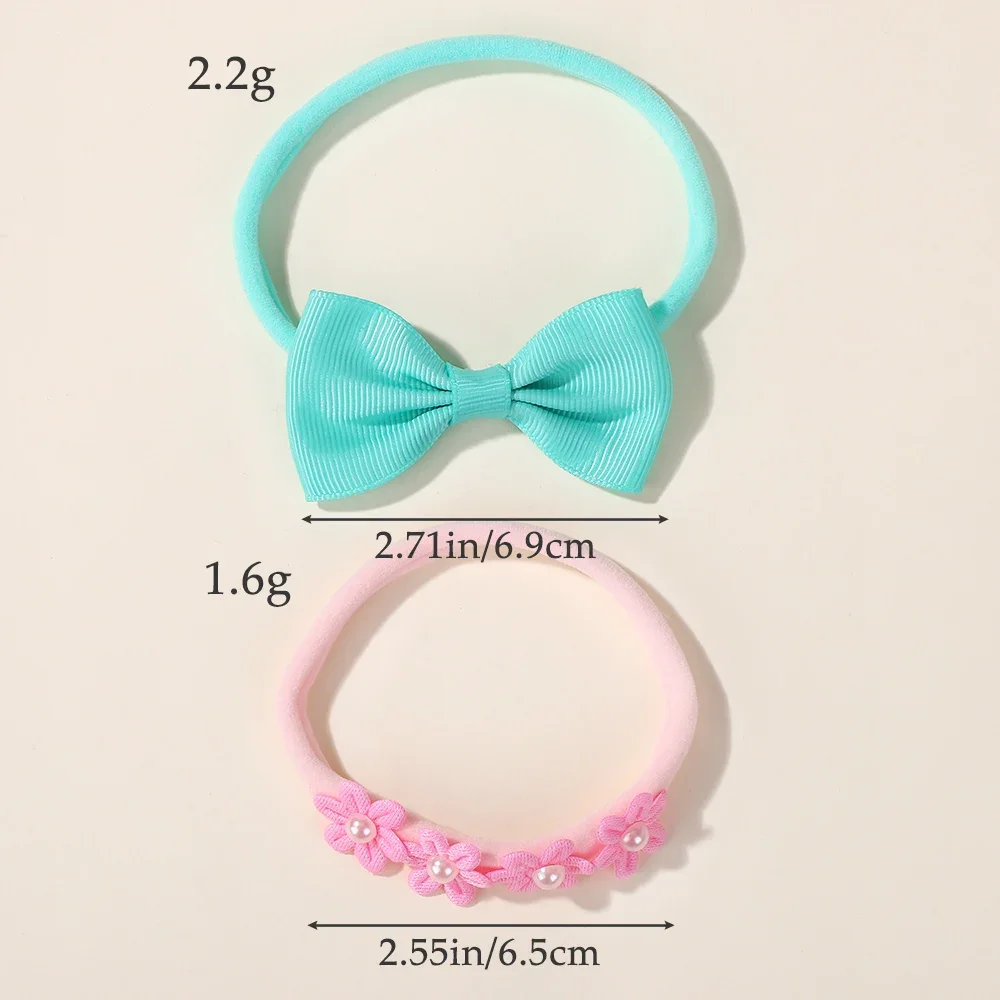 Diadema elástica para niñas con lazos y flores en tonos suaves - imagen 4