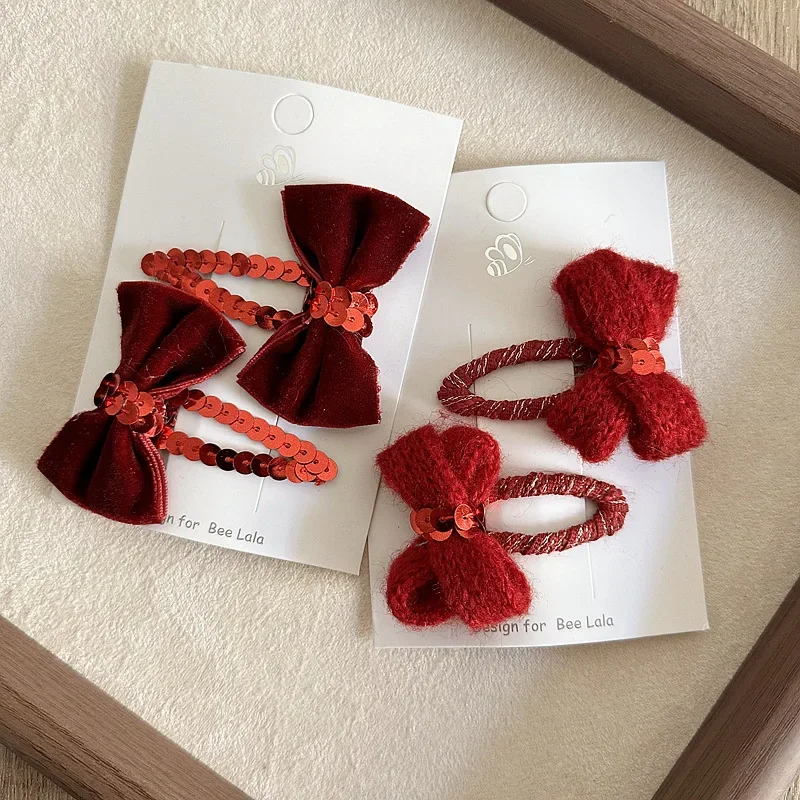 Pinzas para el pelo de bebé rojas - navideñas con lazo elegante - imagen 3