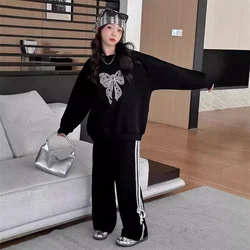Conjunto de jersey y pantalón para niño con pajarita elegante