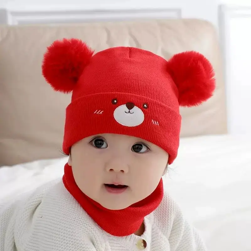 Gorro de punto con cara bordada para bebé