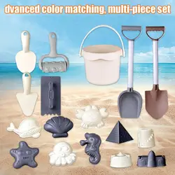 Juego de playa con cubo, moldes animales, pala y regadera
