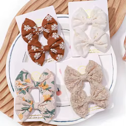 Accesorios de cabello bebé: pinzas y horquillas con lazos bordados