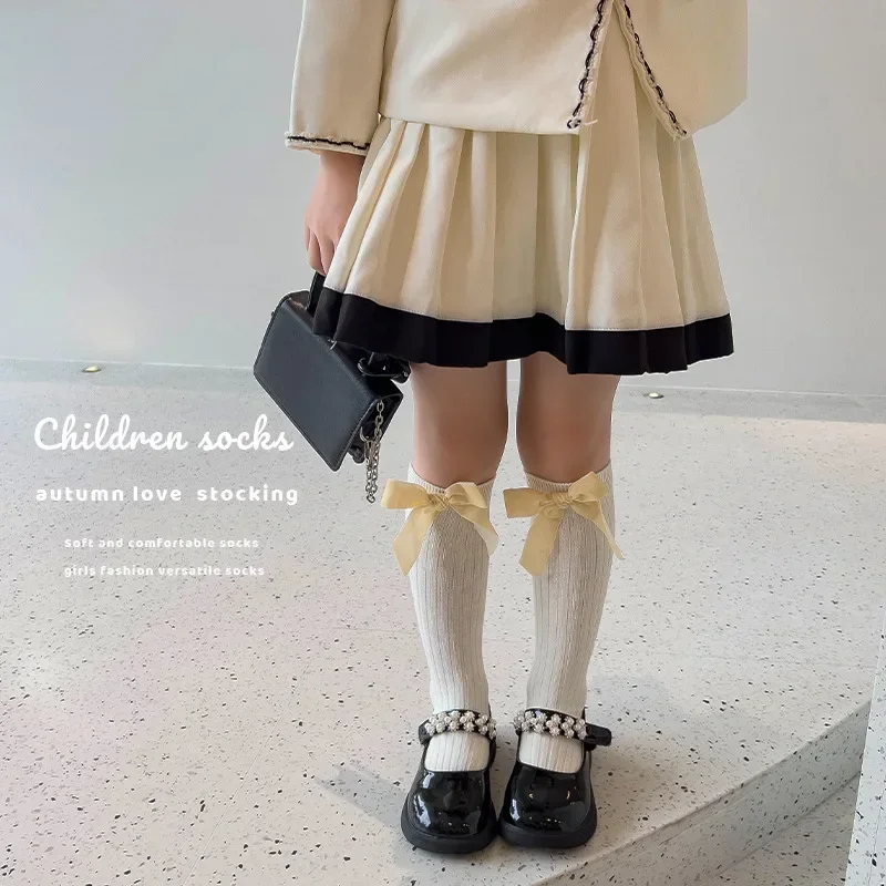 Calcetines altos de niña con lazo en punto acanalado estilo princesa