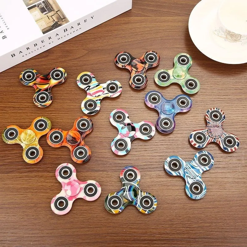 Spinner antiestrés de mano arcoíris para concentración y calma - imagen 3