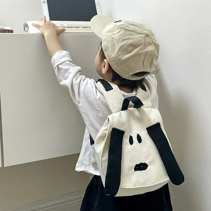 Mochila infantil con dibujos de perros en lona para uso diario