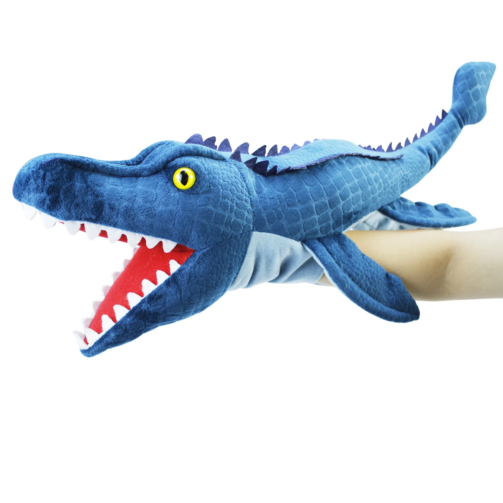 Detalle de marioneta de mano de peluche dinosaurio