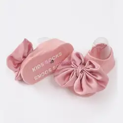 Calcetines antideslizantes para bebé y diadema con lazo