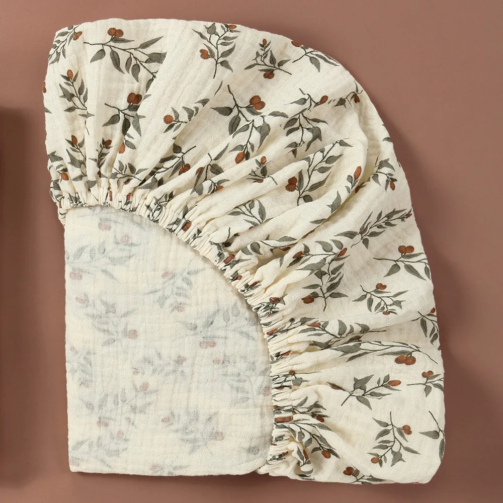 Sábana ajustable orgánica para cuna suave estilo boho neutral