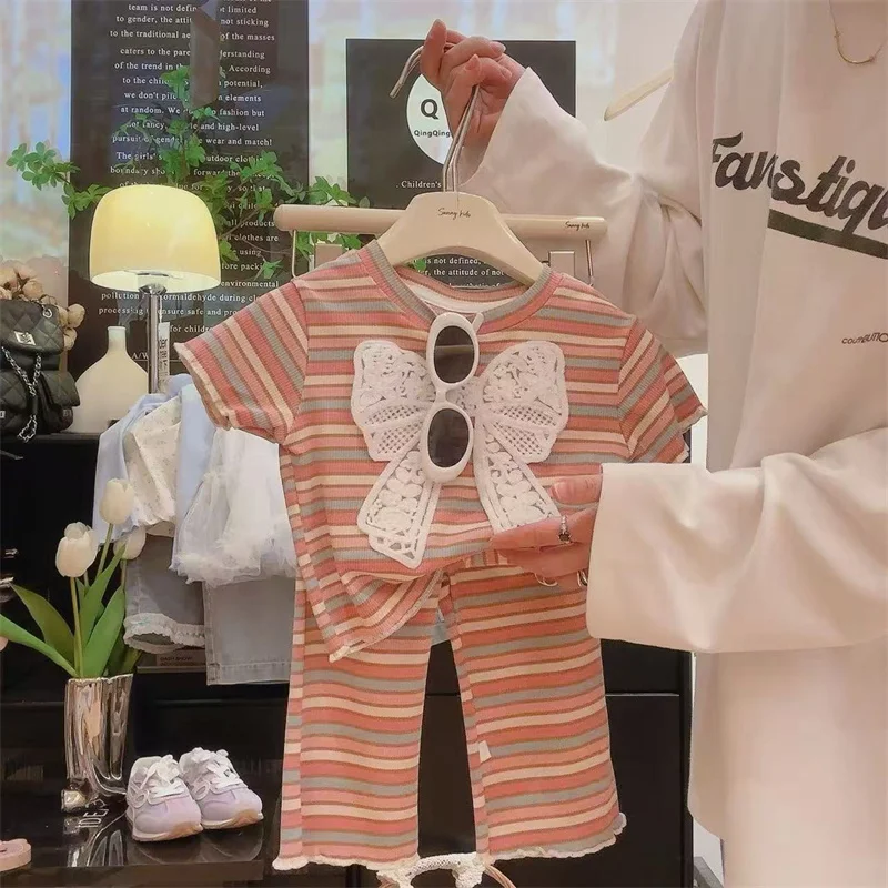Conjunto de niña verano a rayas, camiseta lazo y pantalón - imagen 4