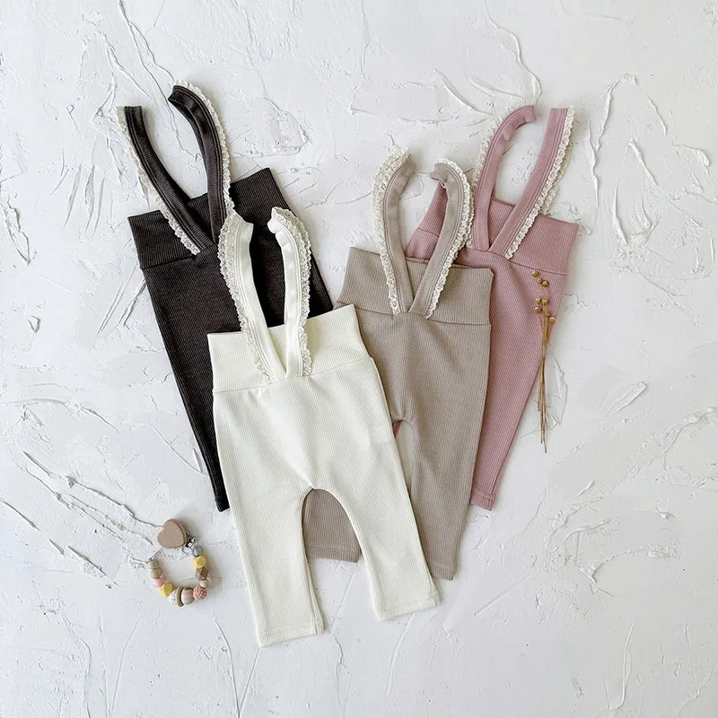 Pantalones de talle alto con correas de encaje en color rosa
