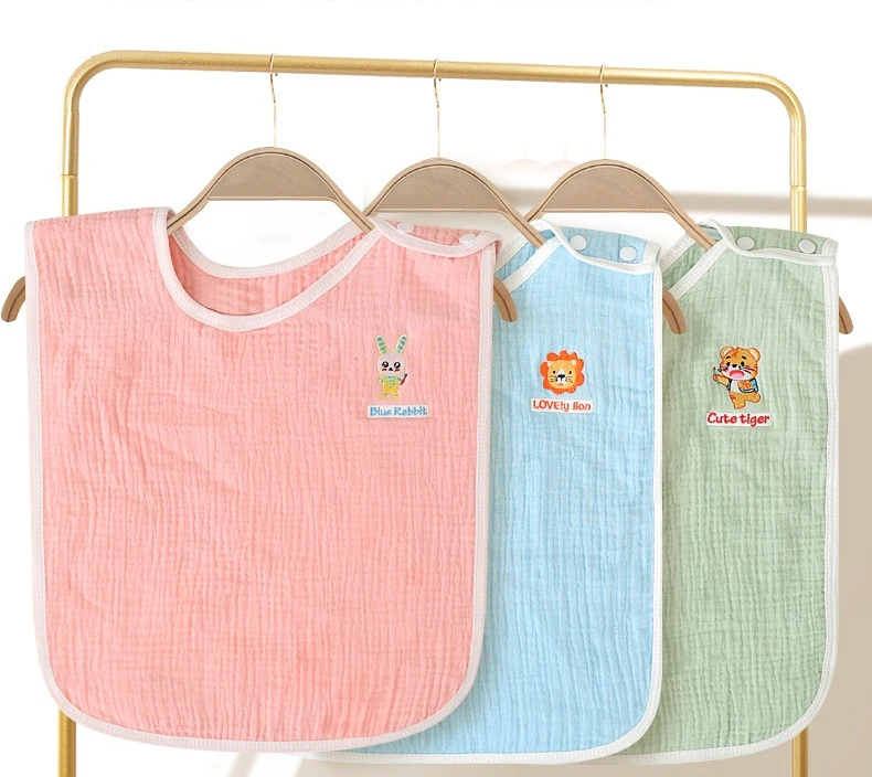 Baberos impermeables para niños y niñas, estilo dibujos animados