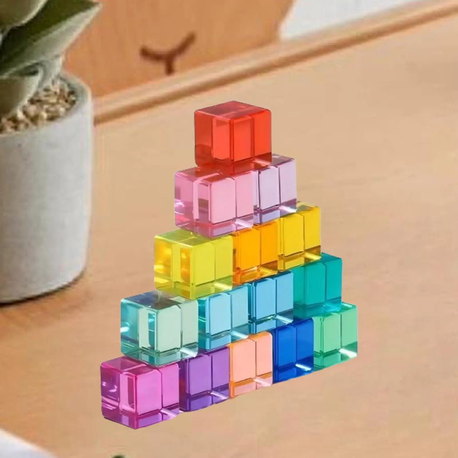 Bloques de construcción arcoíris con cubos translúcidos para apilar