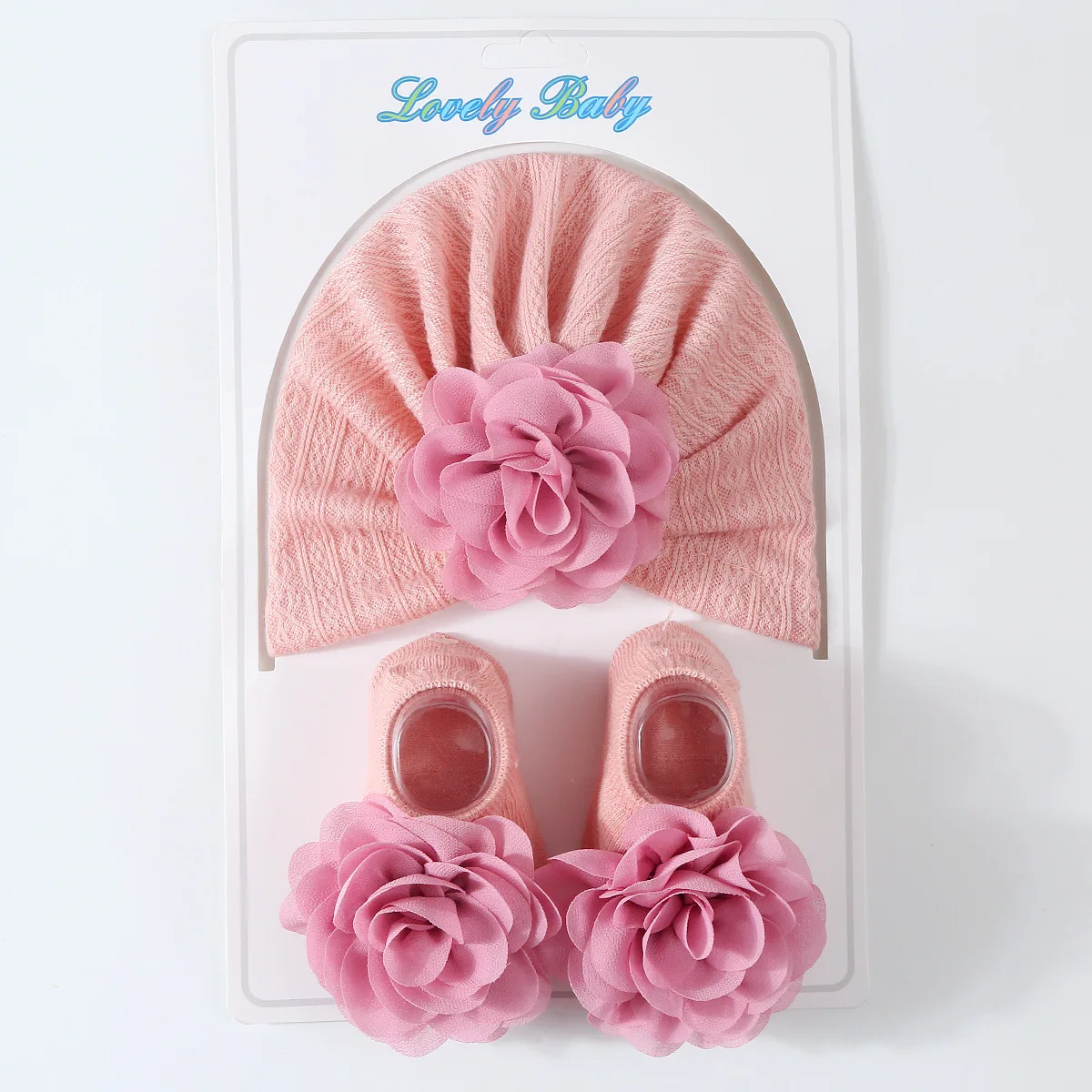 Conjunto gorro floral y calcetines para recién nacido