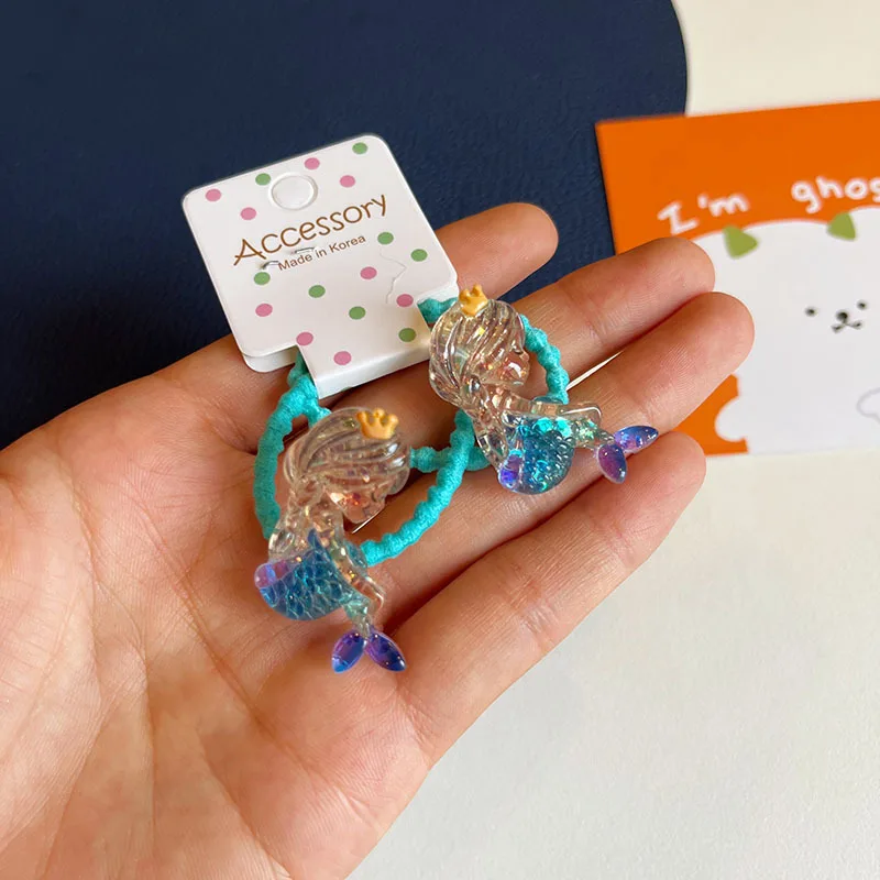 Par de accesorios de temática oceánica para niña
