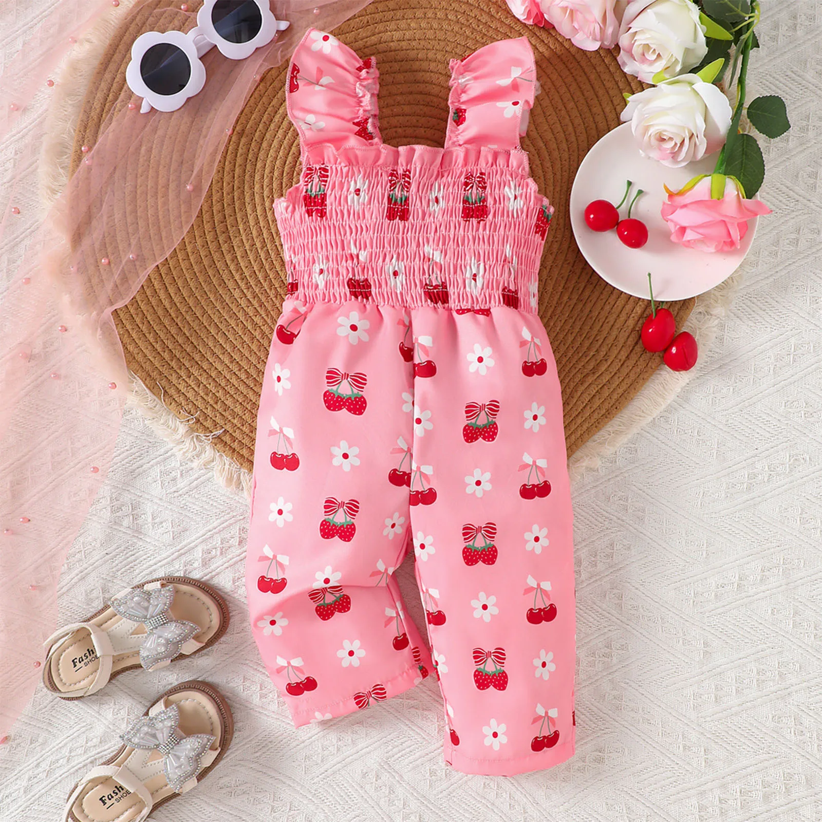 Mono estampado de verano para niña con cintura alta y volantes