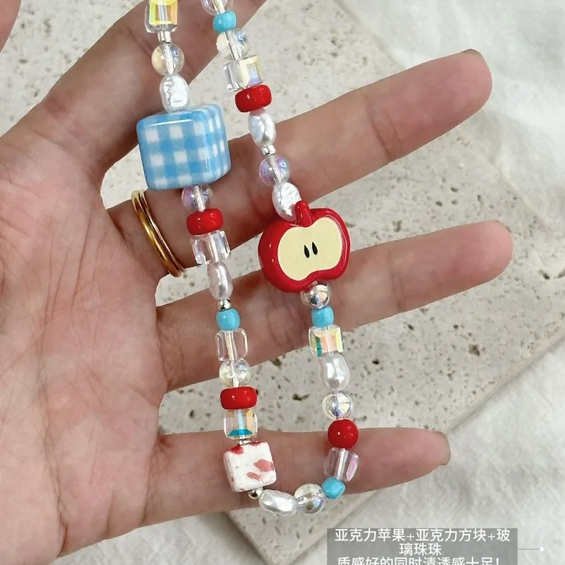 Cordón antipérdida para el móvil con cuentas de perlas para iPhone - imagen 4