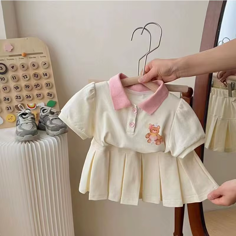 Conjunto niña verano top manga corta con solapa y falda ligera - imagen 2