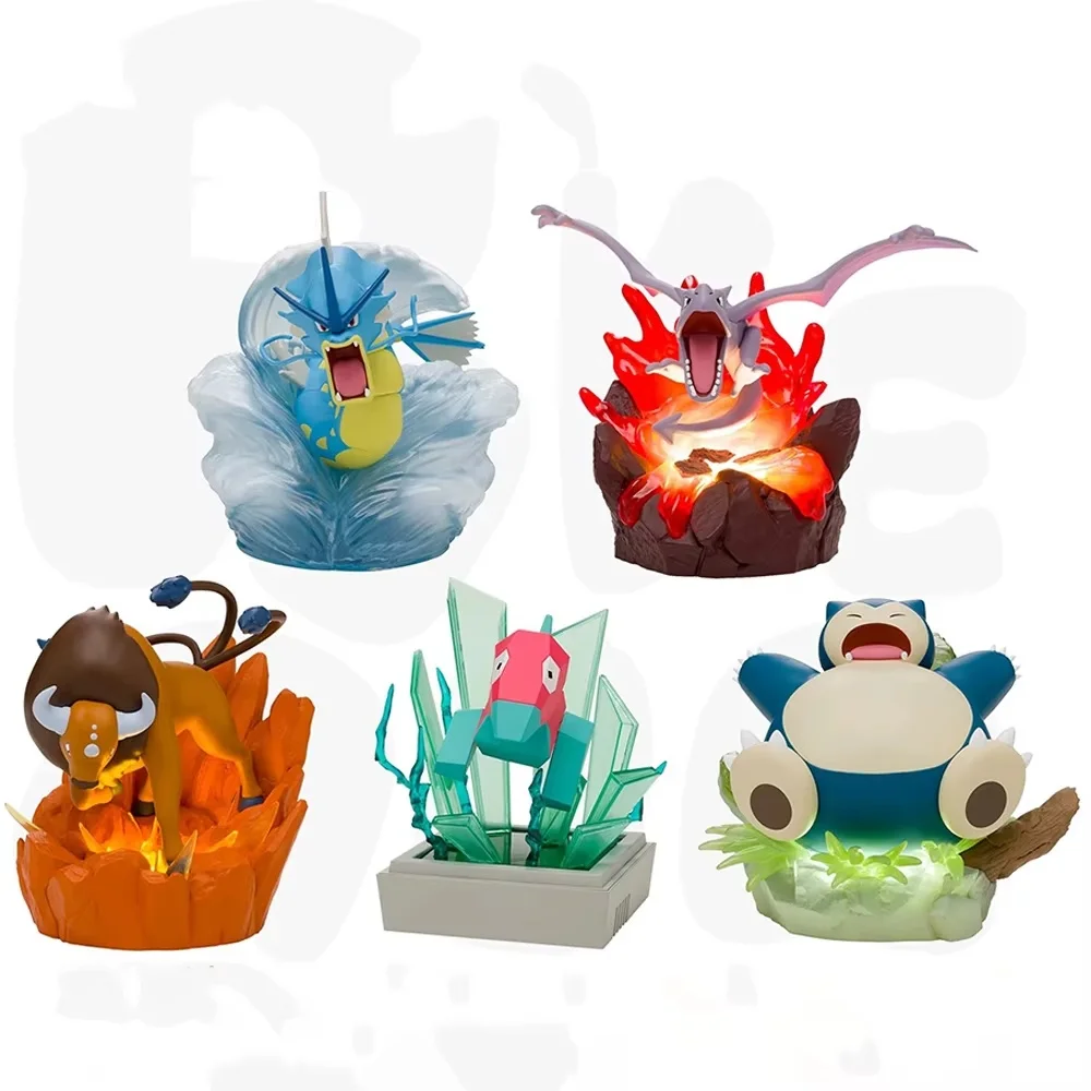 Figura coleccionable Pokémon con Snorlax y Aerodactyl sentada