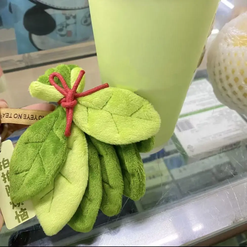 Llavero amuleto de buena suerte con hoja de pomelo verde de peluche