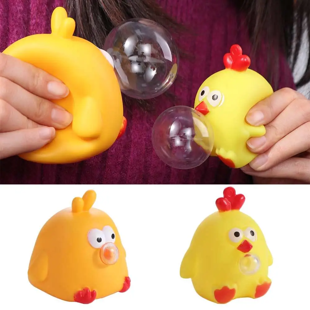 Juguete de apretar elástico con pollo para bebés - imagen 2