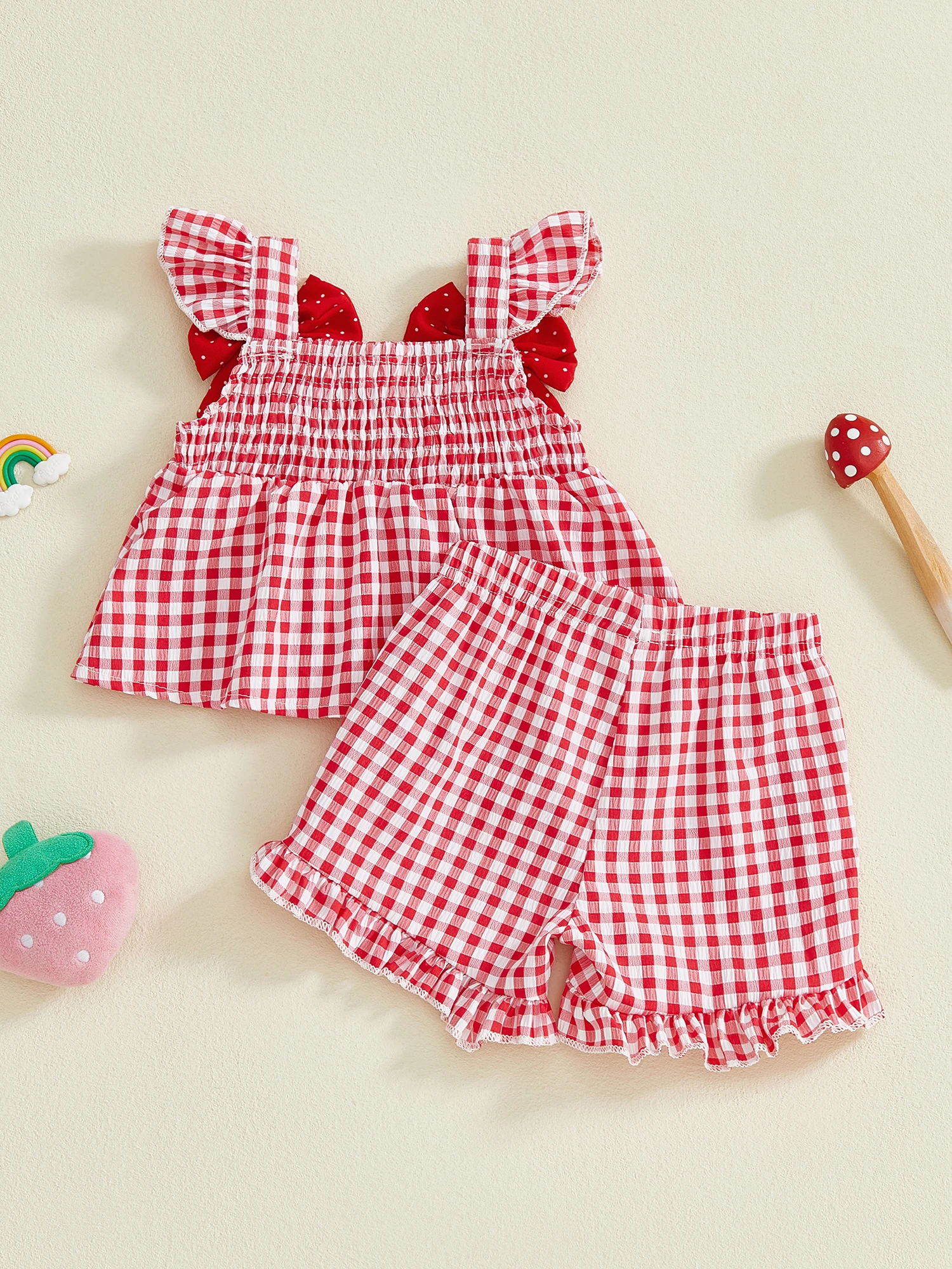 Vista del conjunto con volantes y falda/pantalón corto para bebé niña